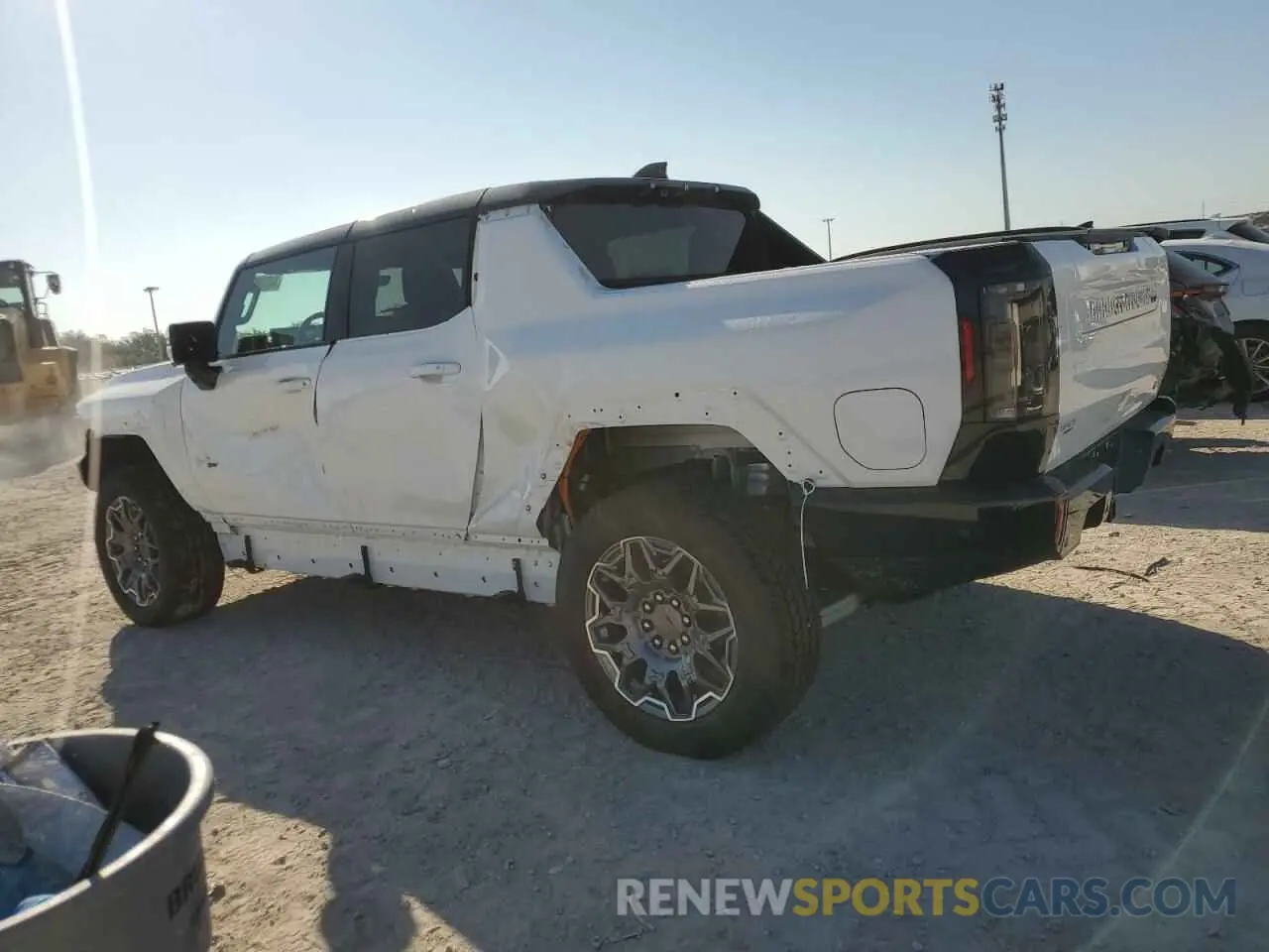 2 Фотография поврежденного автомобиля 1GT10DDB1SU103382 GMC HUMMER PIC 2025