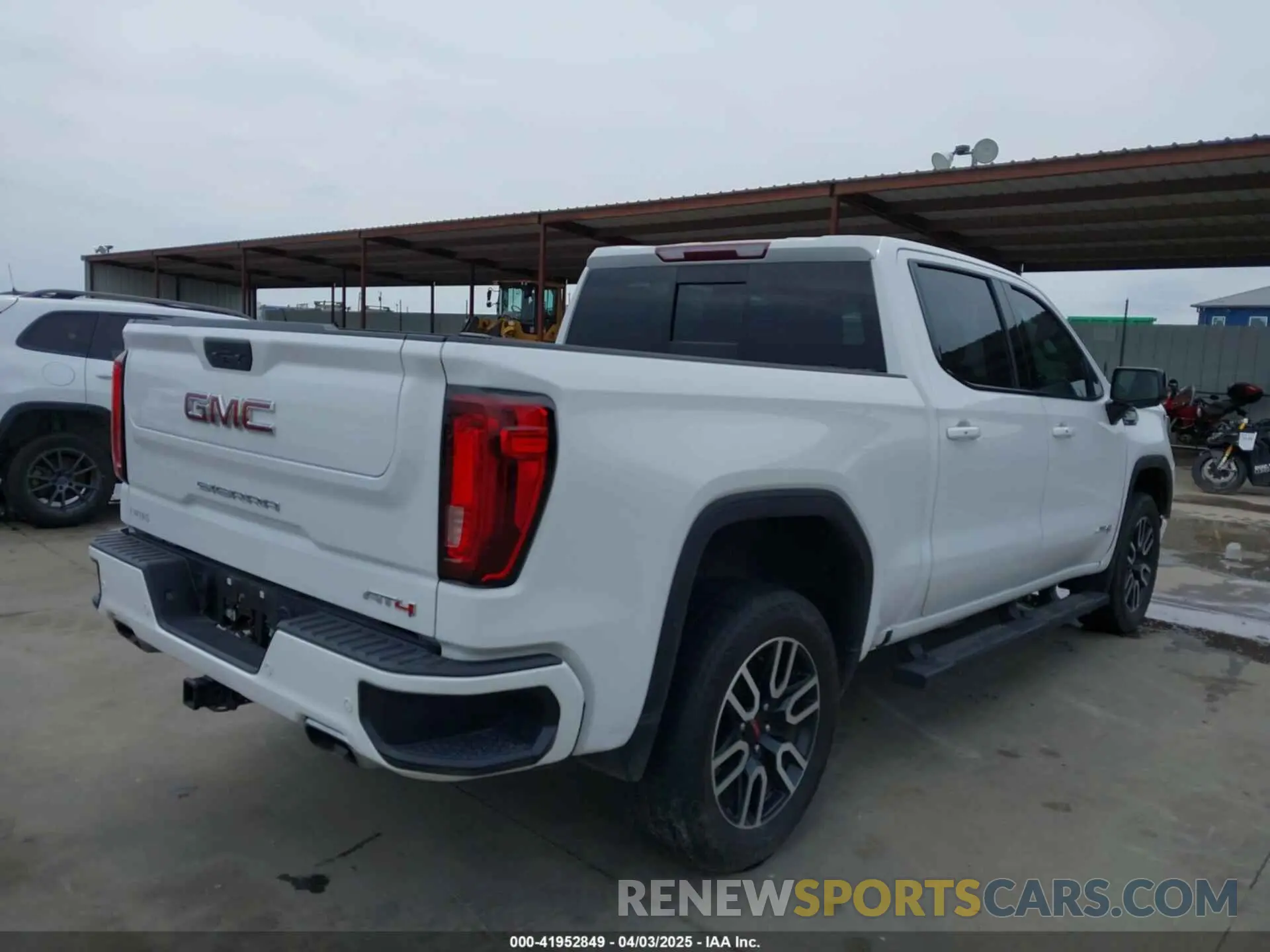 4 Photograph of a damaged car 3GTP9EED0MG239885 GMC SIERRA 1500 2021