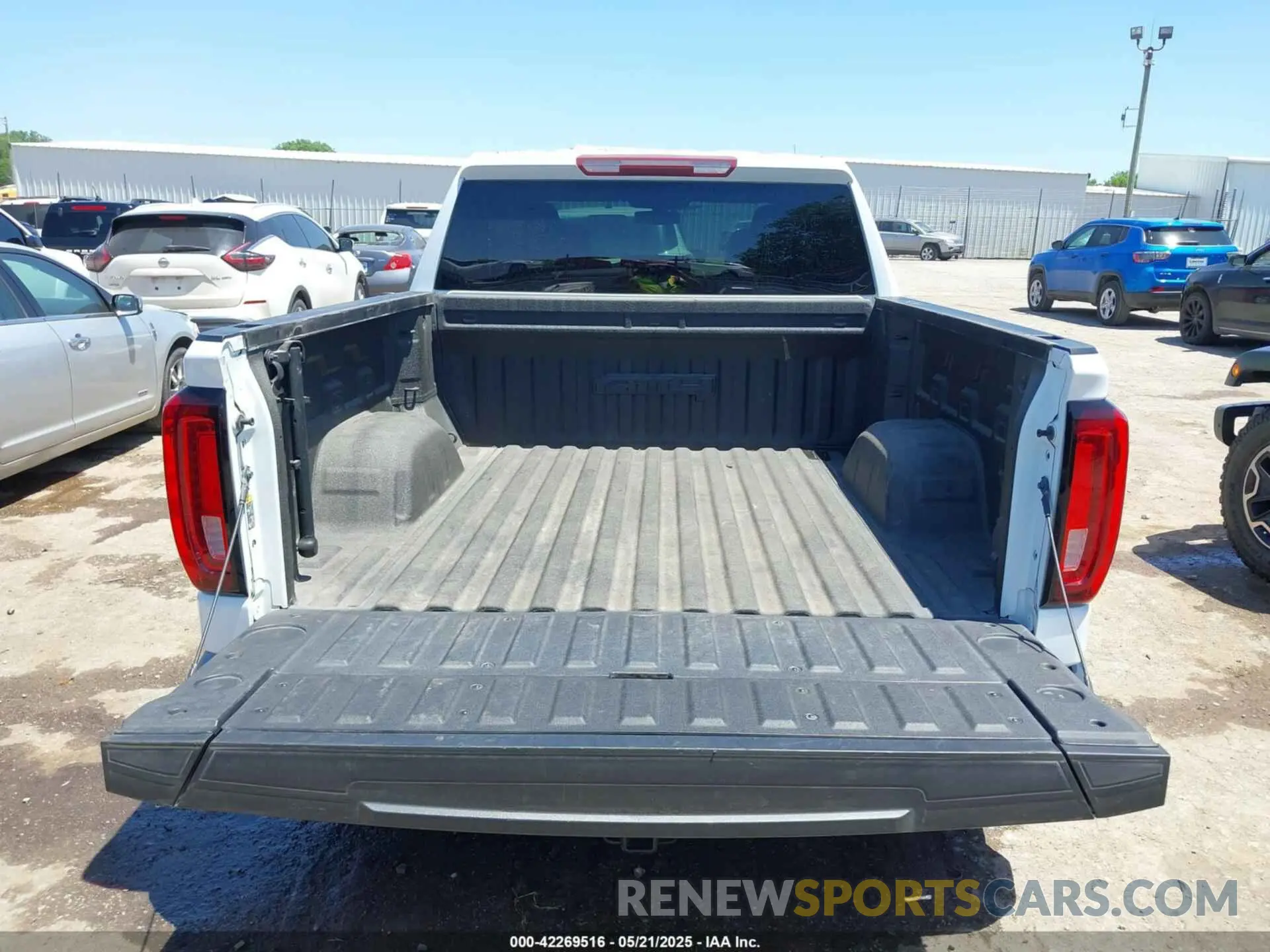 16 Photograph of a damaged car 3GTP9EEL1MG399717 GMC SIERRA 1500 2021
