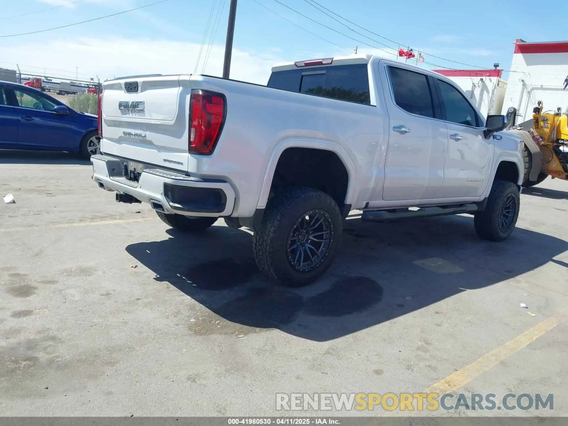 4 Photograph of a damaged car 3GTU9FET7MG422796 GMC SIERRA 1500 2021