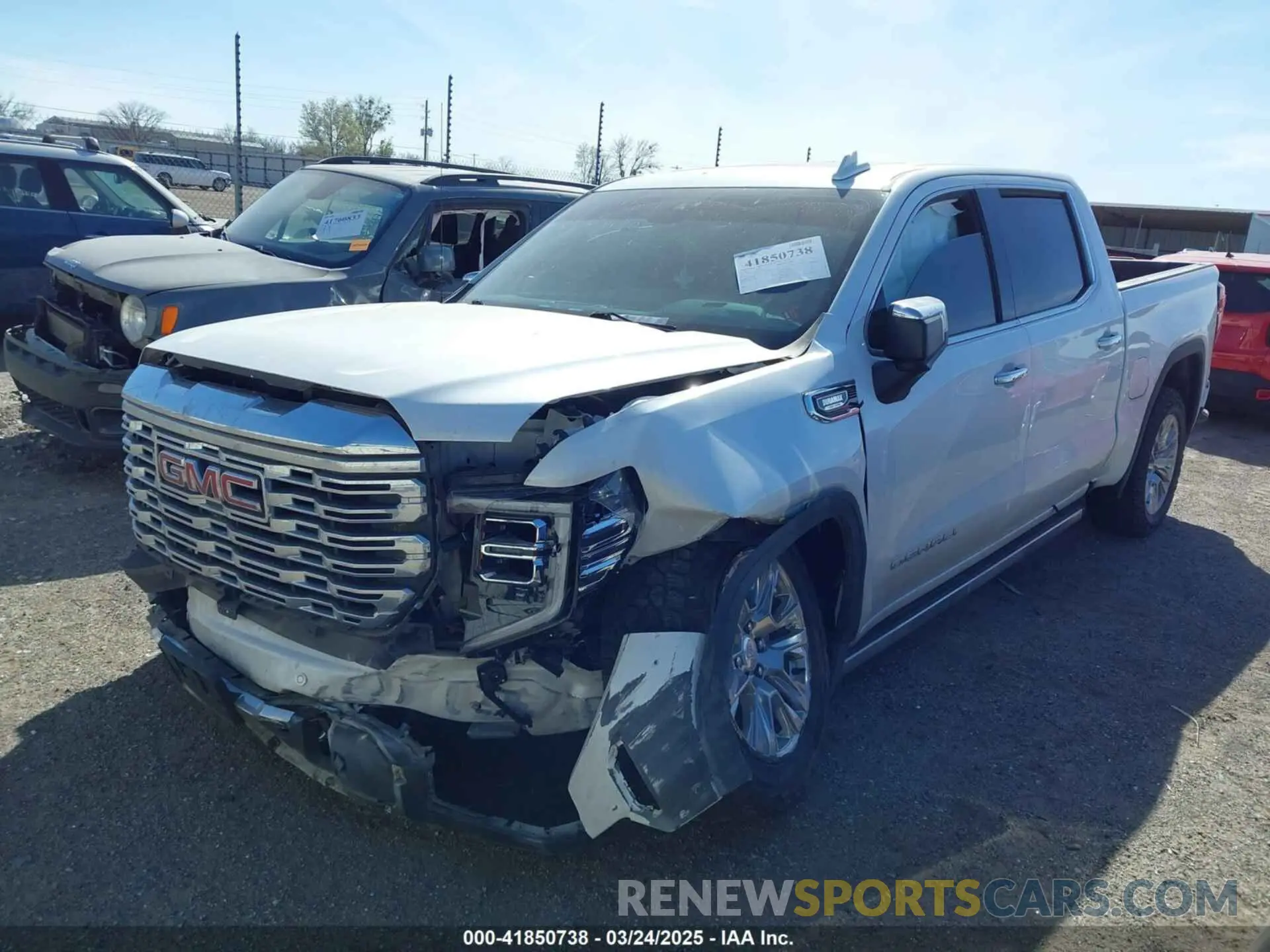 2 Photograph of a damaged car 3GTUUGET0NG599597 GMC SIERRA 1500 2022