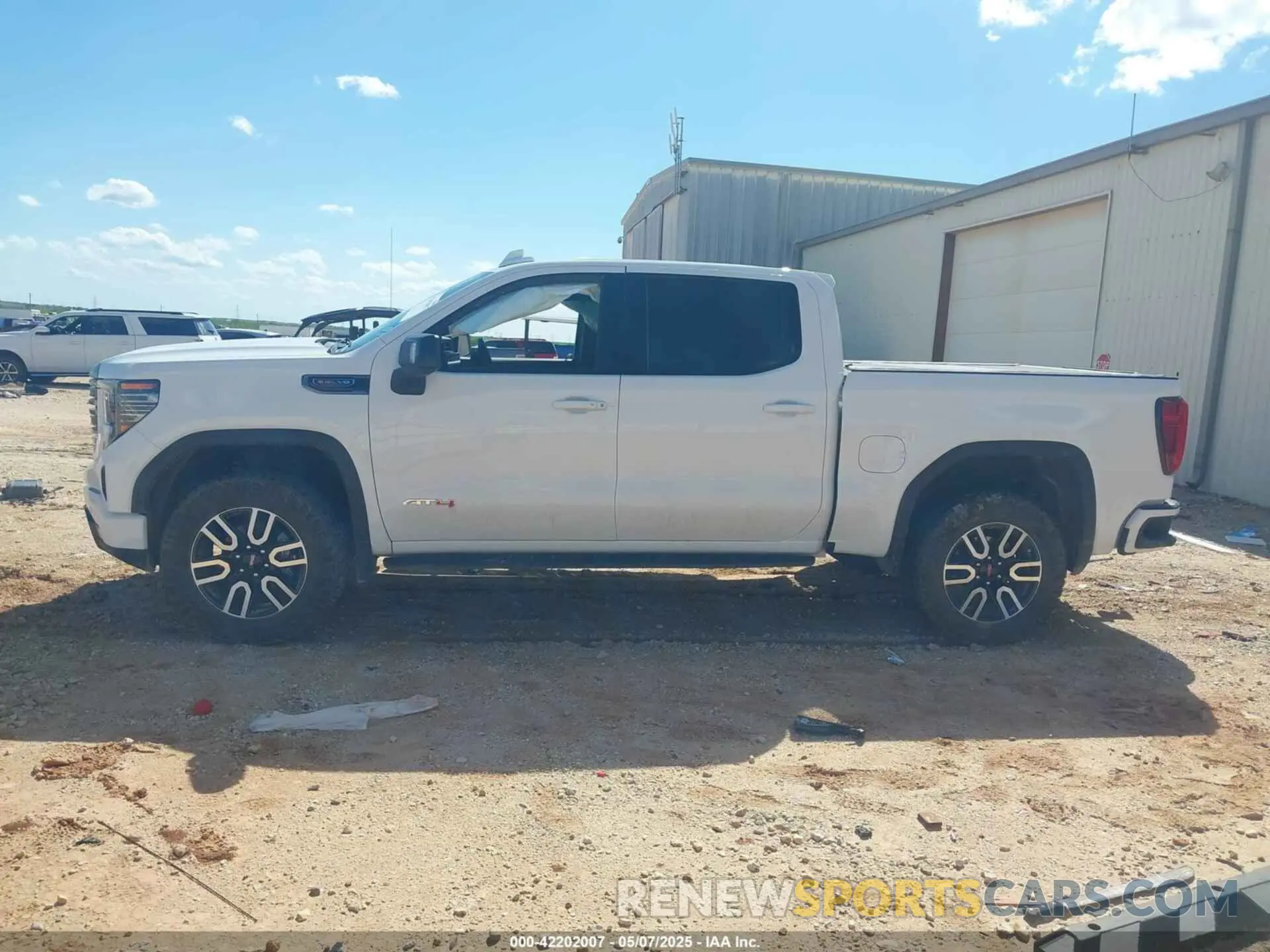 14 Photograph of a damaged car 1GTUUEEL2PZ200017 GMC SIERRA 1500 2023