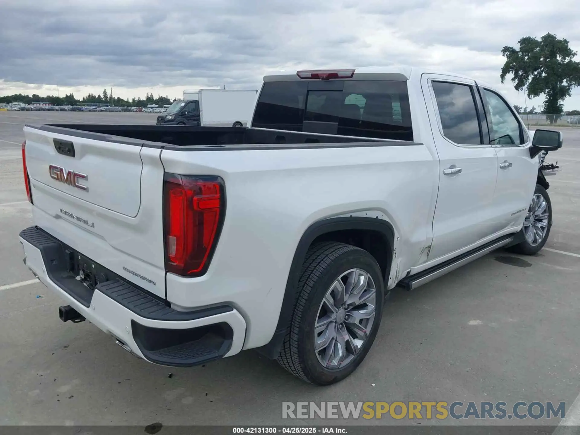 4 Photograph of a damaged car 1GTUUGED6PZ242176 GMC SIERRA 1500 2023