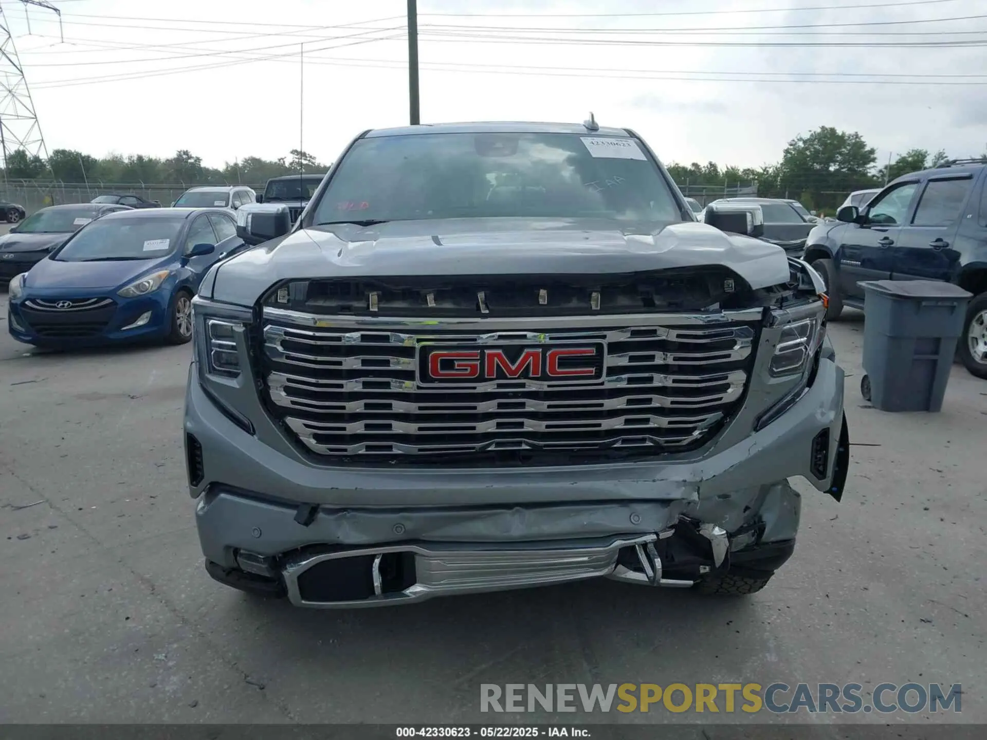 12 Photograph of a damaged car 1GTUUGED7PZ270231 GMC SIERRA 1500 2023