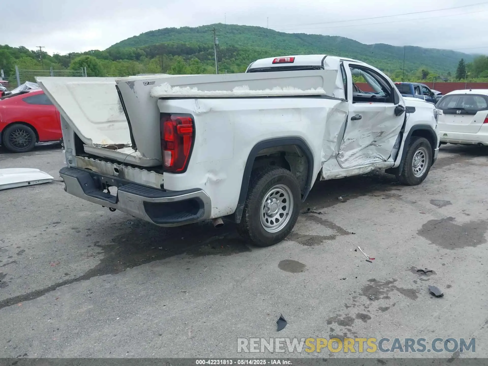 4 Photograph of a damaged car 3GTNHAEK4PG295365 GMC SIERRA 1500 2023