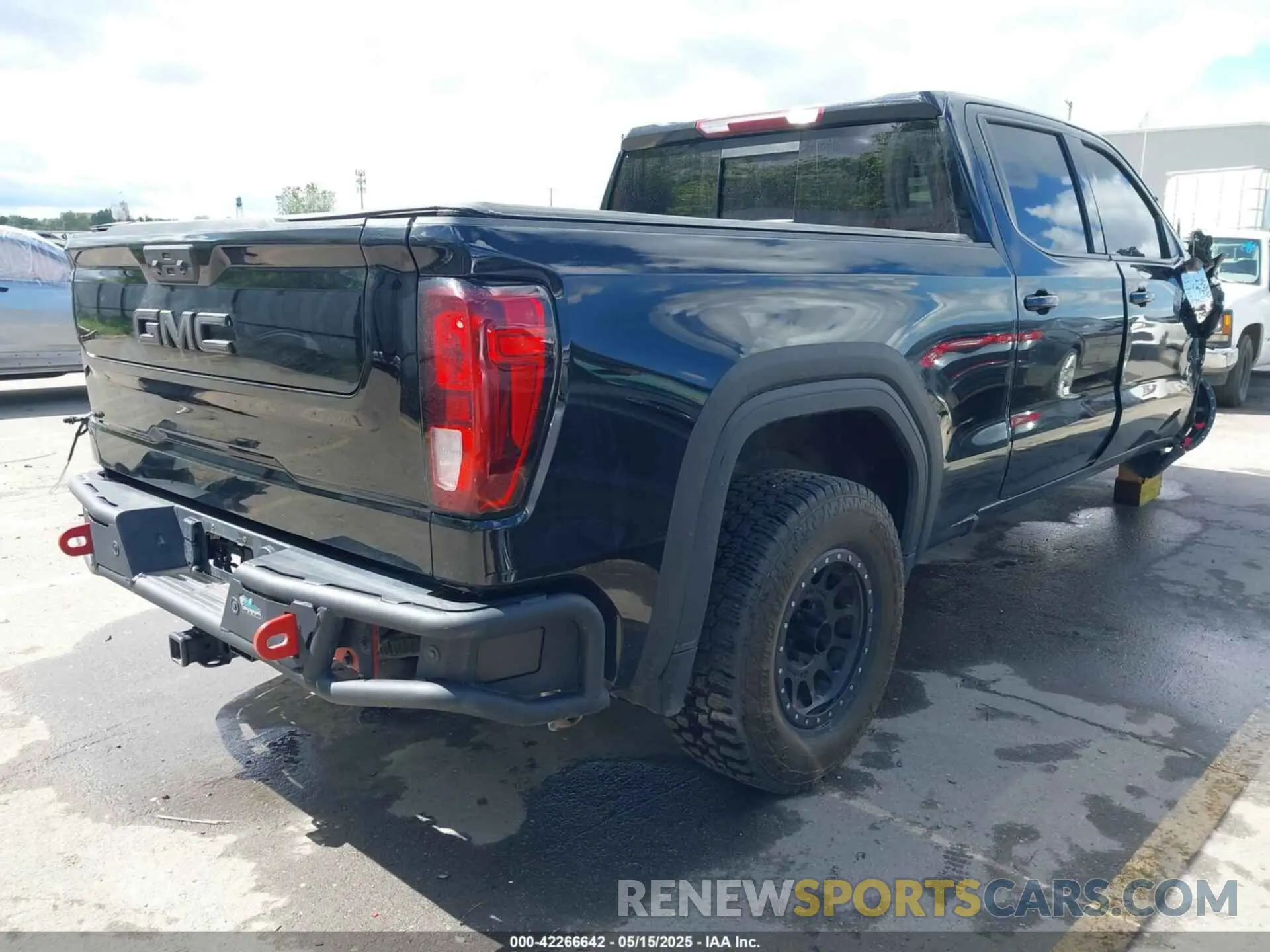 4 Photograph of a damaged car 3GTUUCE81PG322304 GMC SIERRA 1500 2023