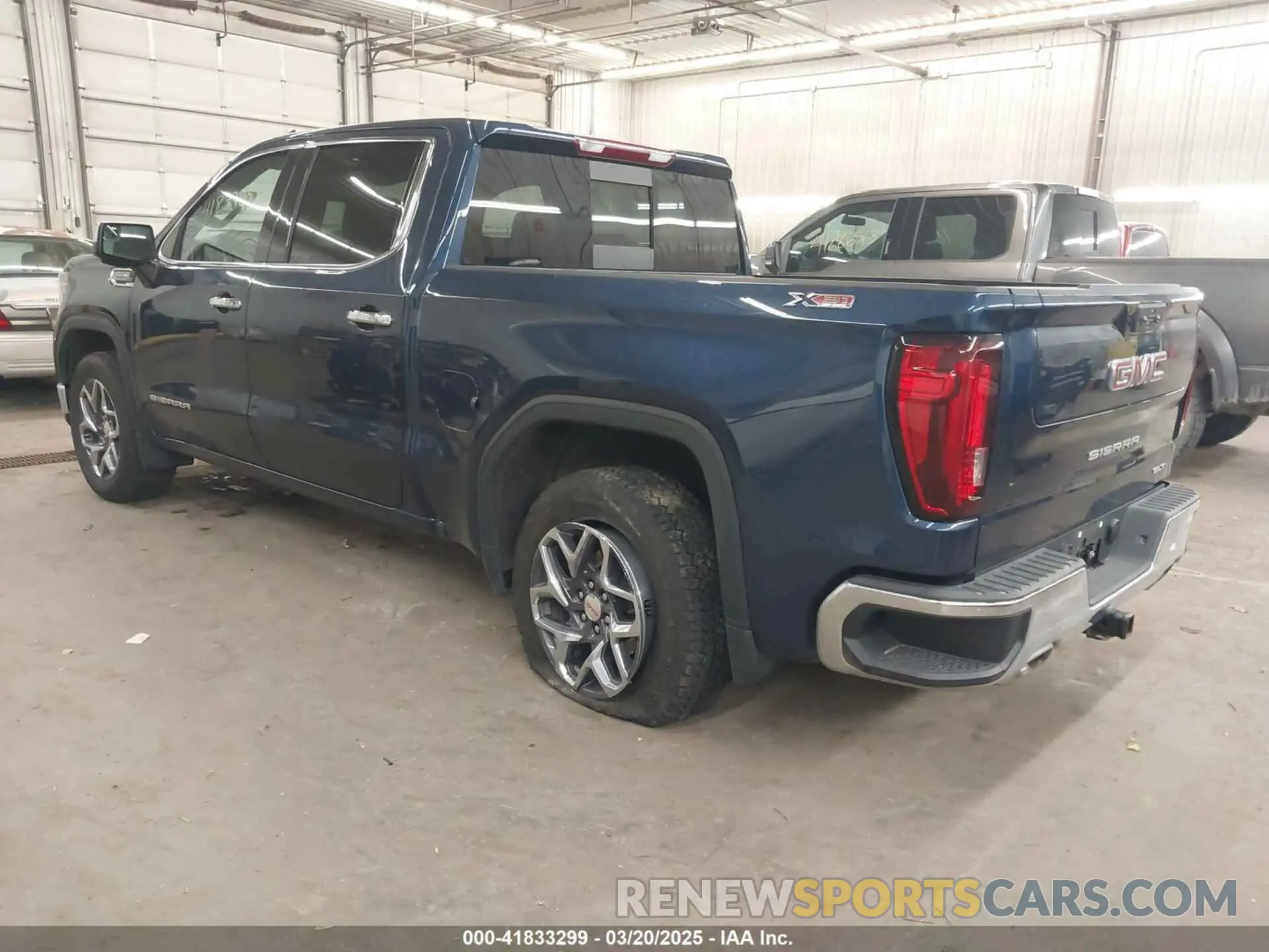 3 Photograph of a damaged car 3GTUUDED6PG116012 GMC SIERRA 1500 2023