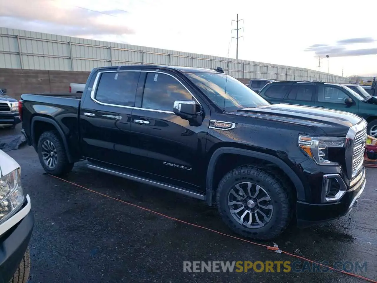 4 Photograph of a damaged car 1GTU9FEL1KZ352922 GMC SIERRA 2019