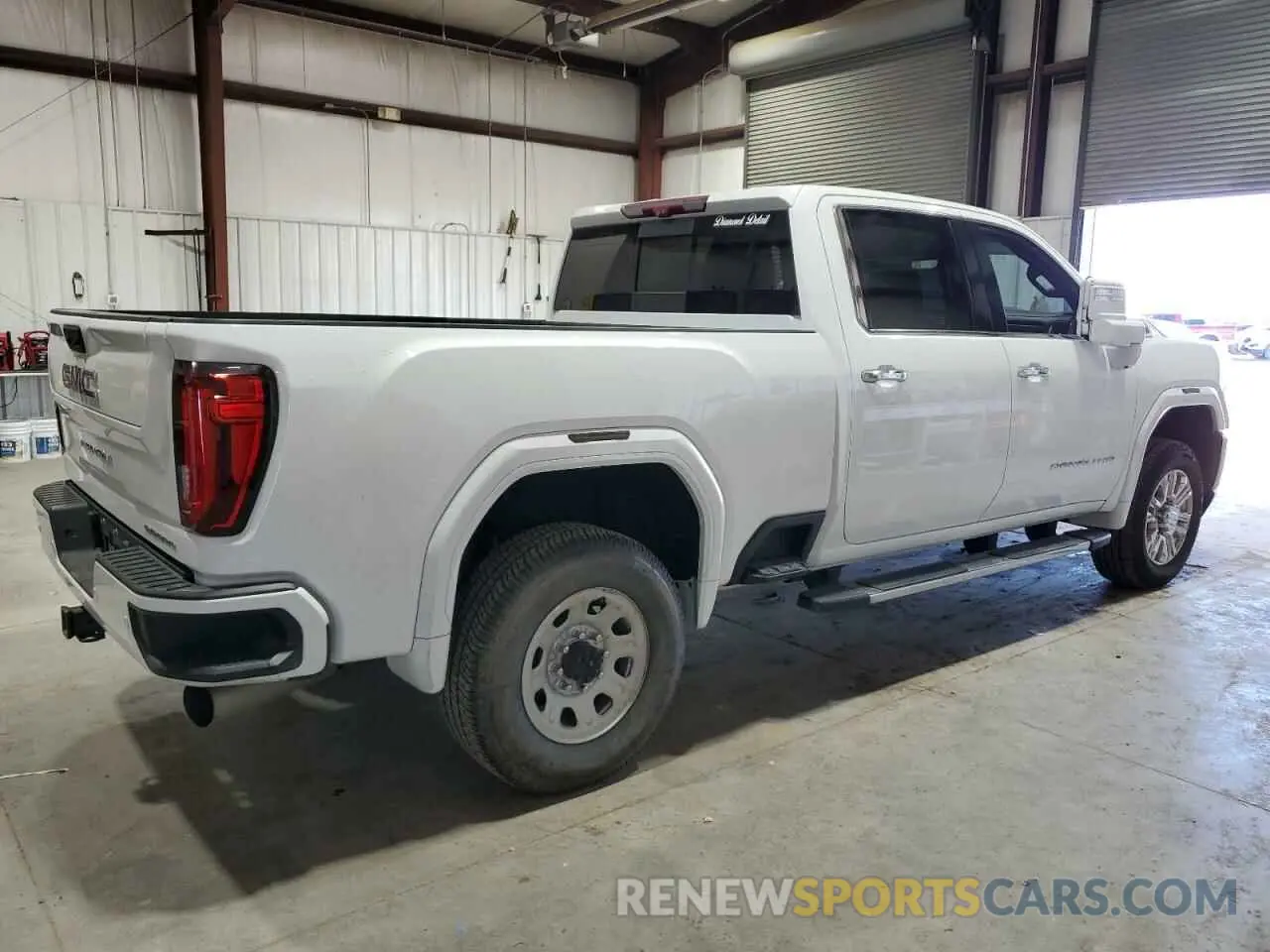 3 Photograph of a damaged car 1GT49REY3LF107118 GMC SIERRA 2020