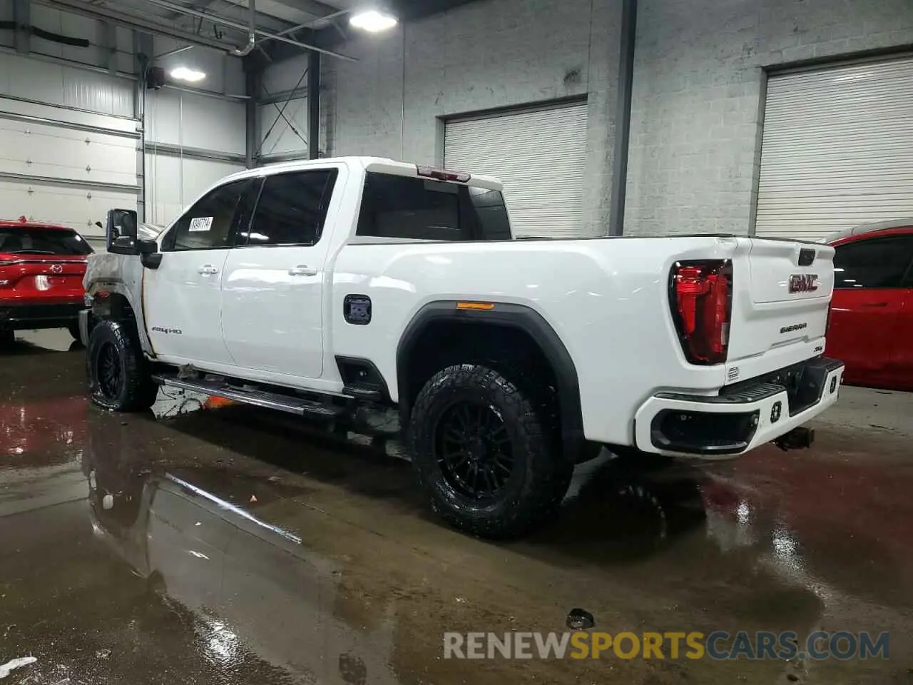2 Photograph of a damaged car 1GT49VEY9LF268615 GMC SIERRA 2020