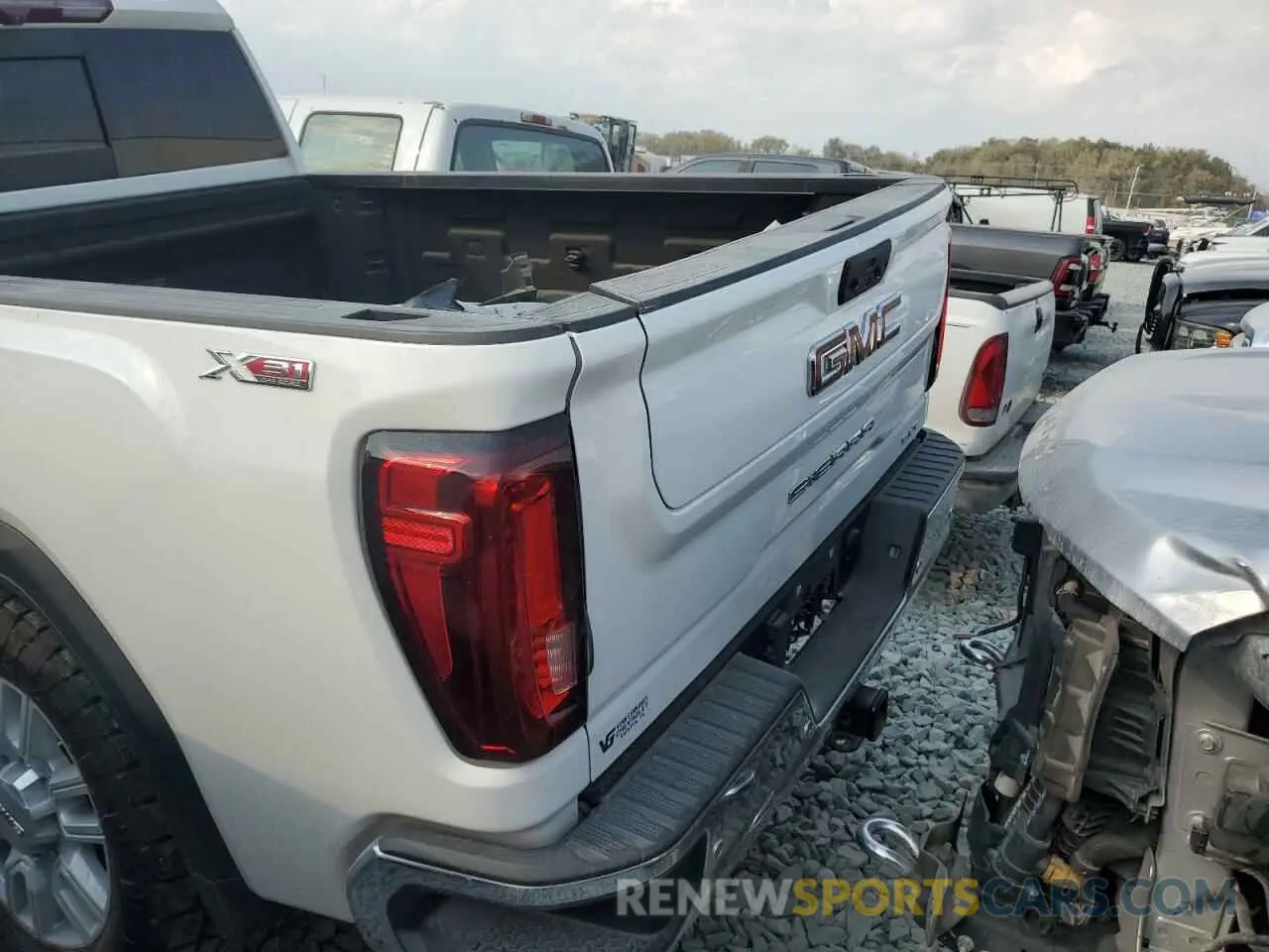 6 Photograph of a damaged car 1GT49NEY1MF134408 GMC SIERRA 2021