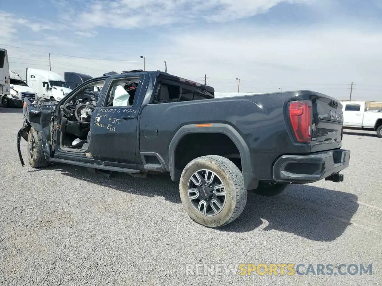2 Photograph of a damaged car 1GT49PEY7MF126079 GMC SIERRA 2021