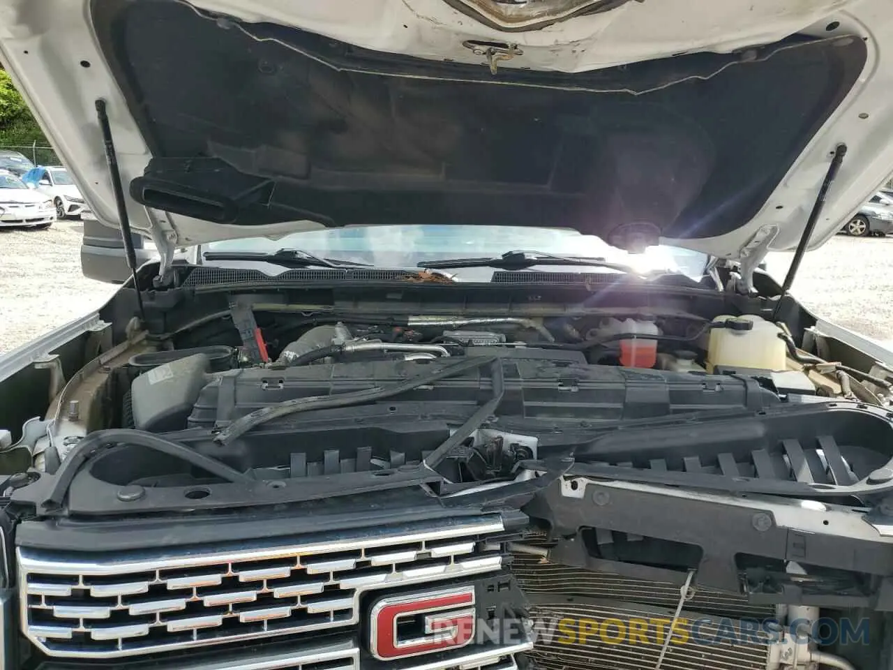13 Photograph of a damaged car 1GT49REY5MF105002 GMC SIERRA 2021