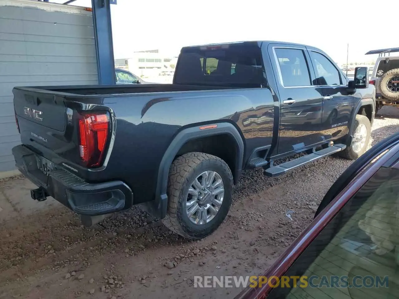 3 Photograph of a damaged car 1GT49REY5MF147279 GMC SIERRA 2021