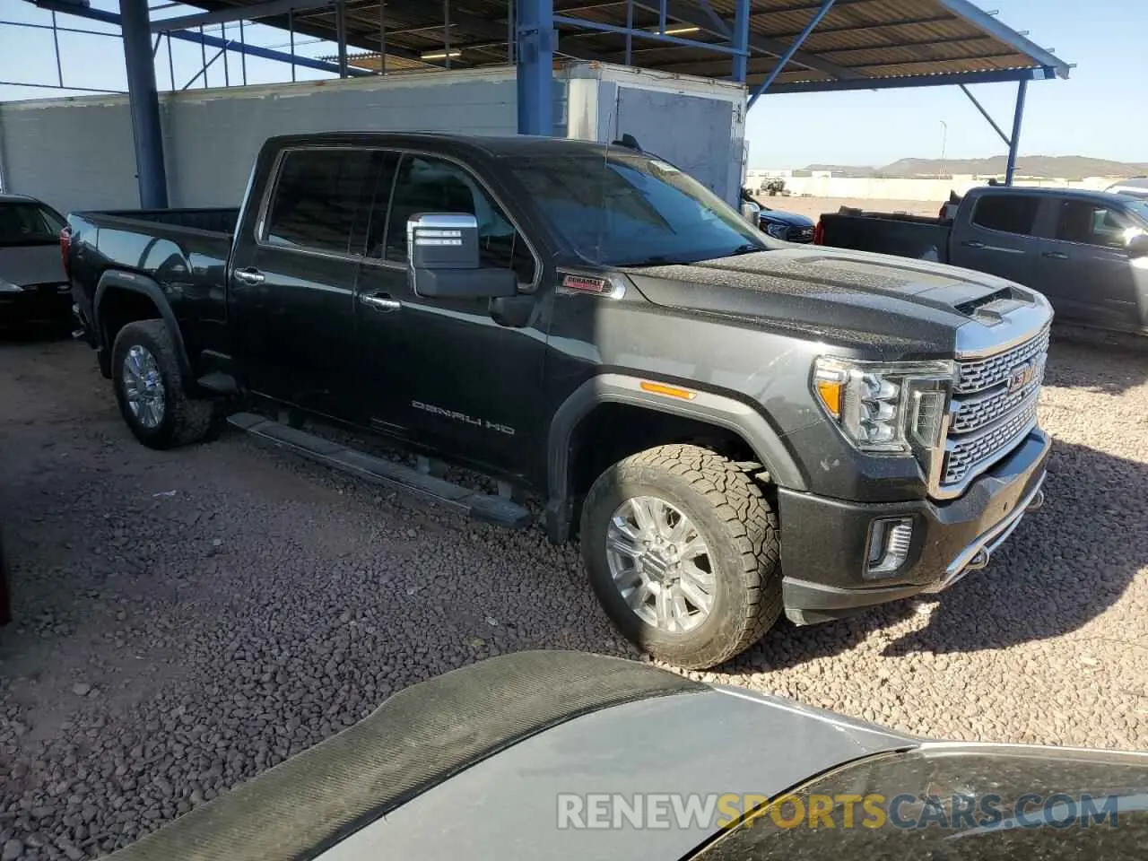 4 Photograph of a damaged car 1GT49REY5MF147279 GMC SIERRA 2021