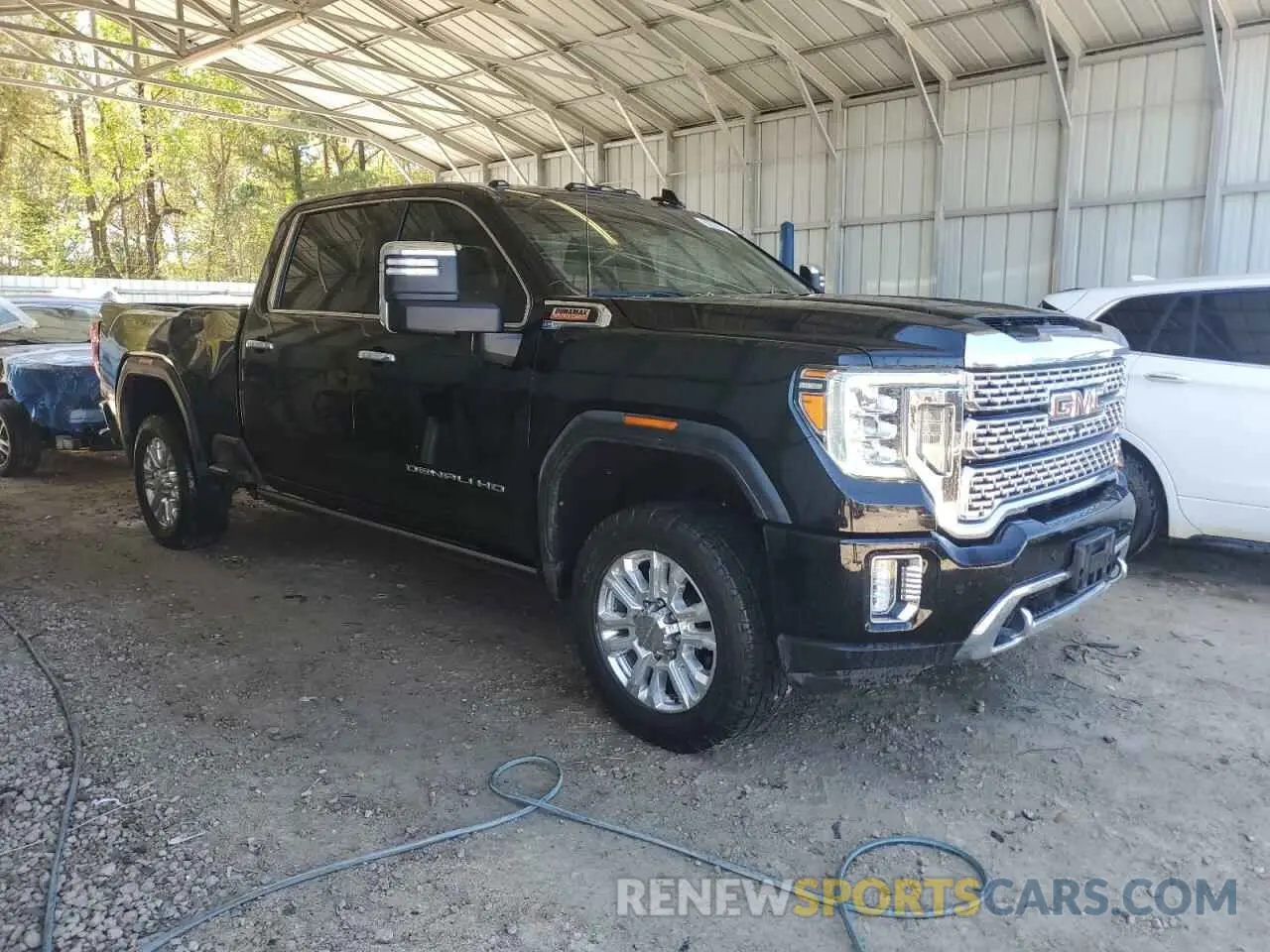 4 Photograph of a damaged car 1GT49REY8MF257596 GMC SIERRA 2021