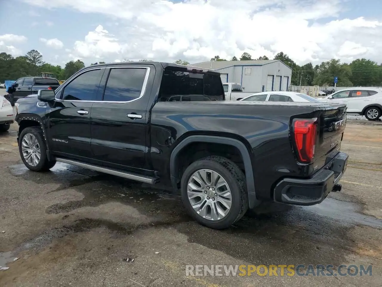 2 Photograph of a damaged car 3GTU9FEL4MG299569 GMC SIERRA 2021