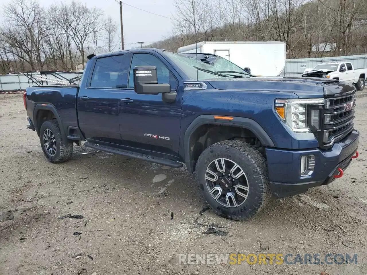 4 Photograph of a damaged car 1GT49PE71NF295653 GMC SIERRA 2022