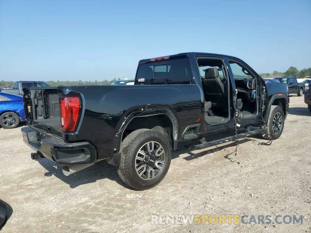 3 Photograph of a damaged car 1GT49PEY0NF335892 GMC SIERRA 2022