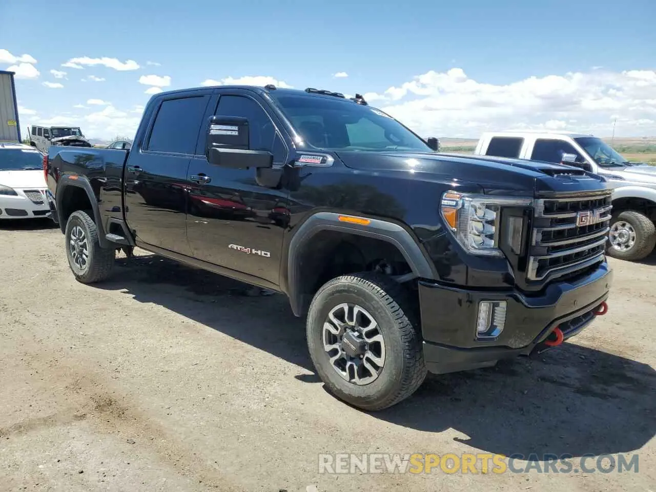 4 Photograph of a damaged car 1GT49PEYXPF215469 GMC SIERRA 2023