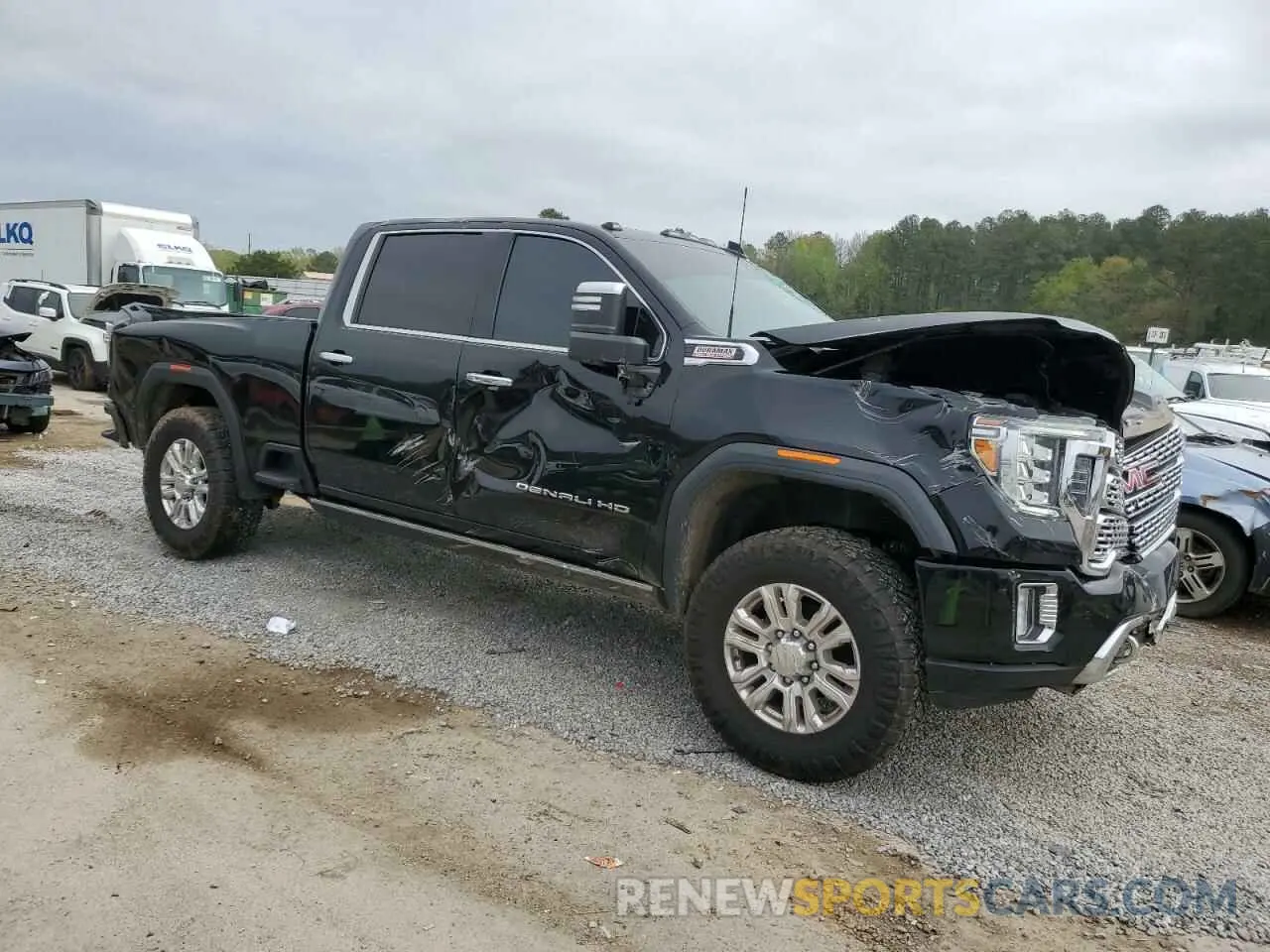 4 Photograph of a damaged car 1GT49REY2PF126183 GMC SIERRA 2023