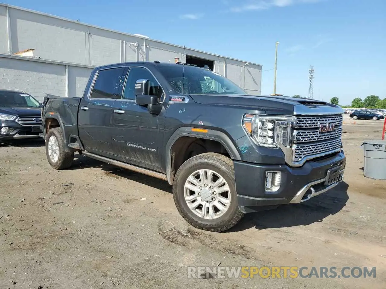 4 Photograph of a damaged car 1GT49REY2PF128287 GMC SIERRA 2023