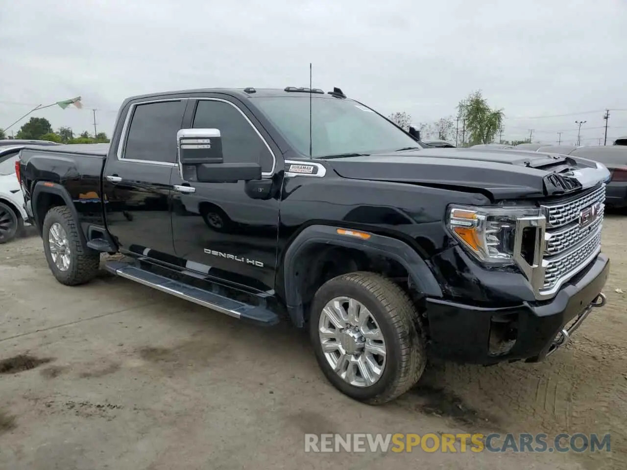 4 Photograph of a damaged car 1GT49REY7PF130245 GMC SIERRA 2023