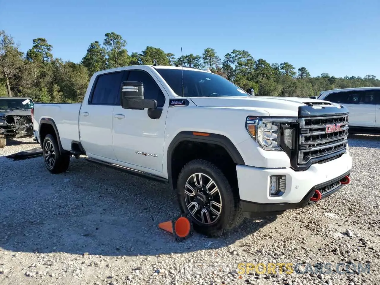 4 Photograph of a damaged car 1GT49VEY2PF140660 GMC SIERRA 2023