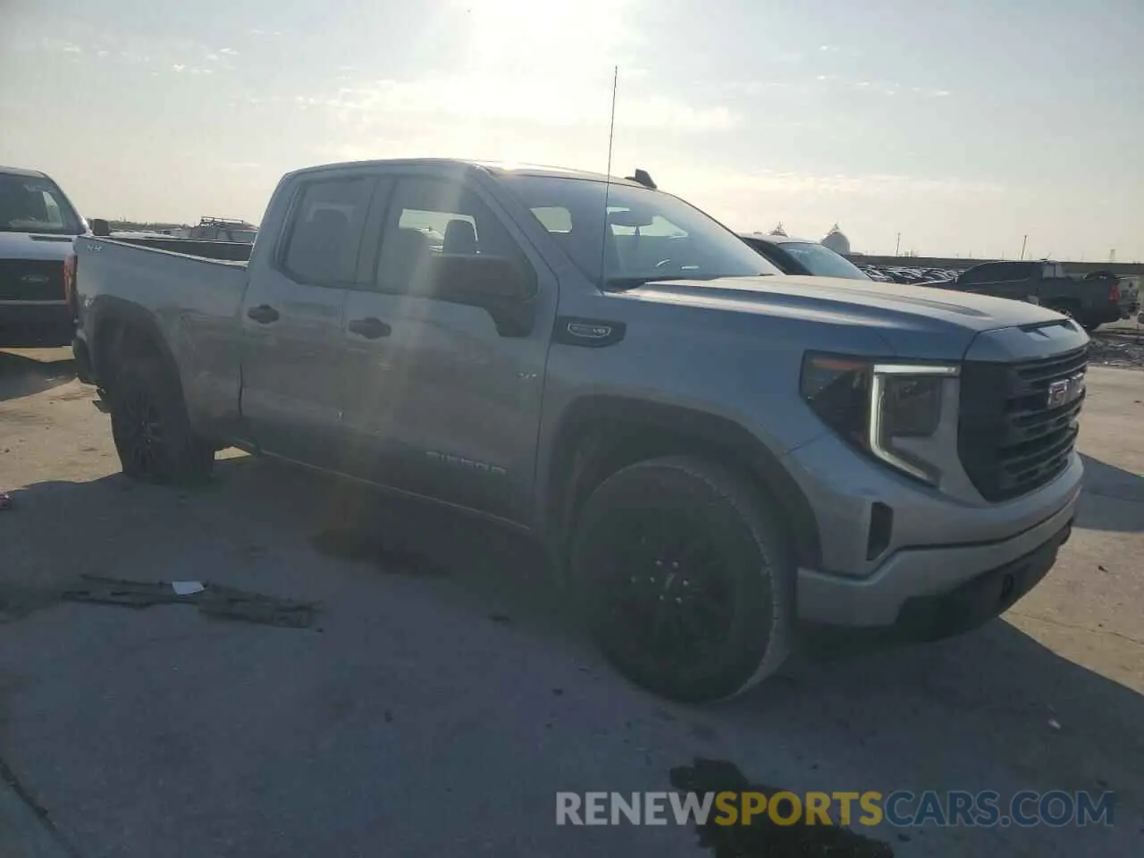4 Photograph of a damaged car 1GTRUAED3PZ323123 GMC SIERRA 2023