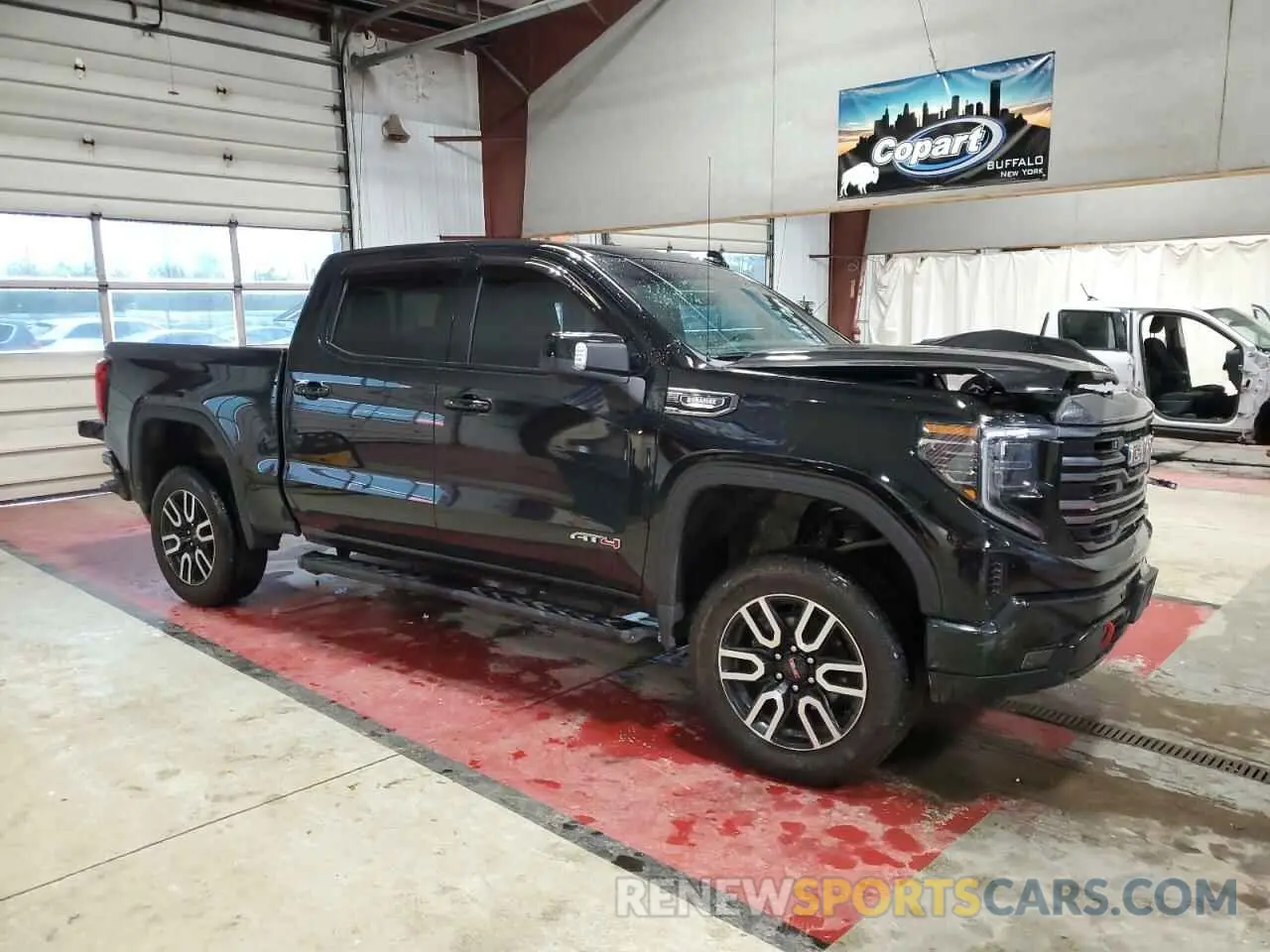 4 Photograph of a damaged car 1GTUUEE84PZ201584 GMC SIERRA 2023