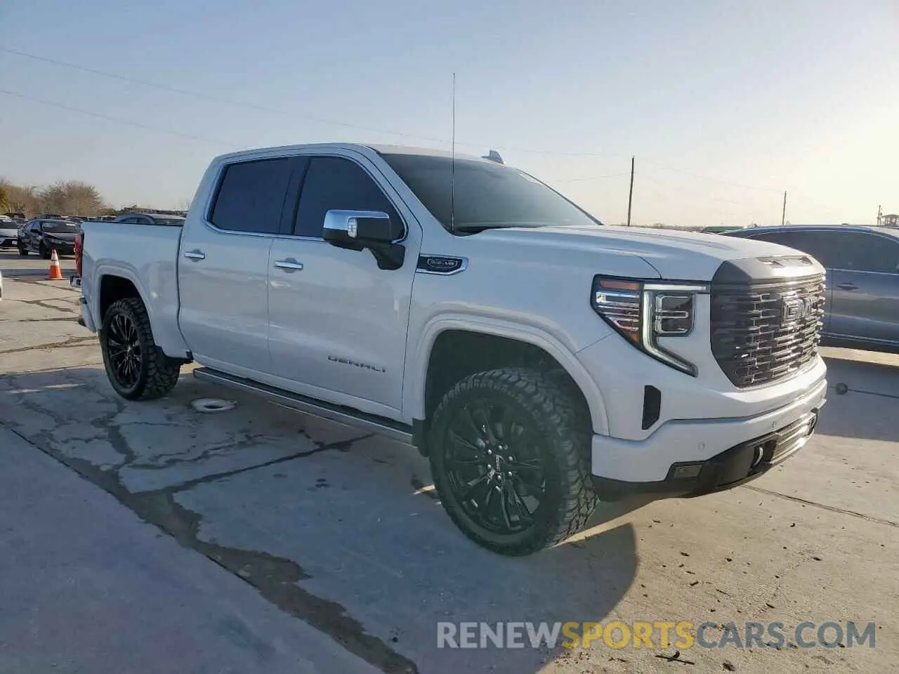 4 Photograph of a damaged car 1GTUUGEL0PZ266450 GMC SIERRA 2023