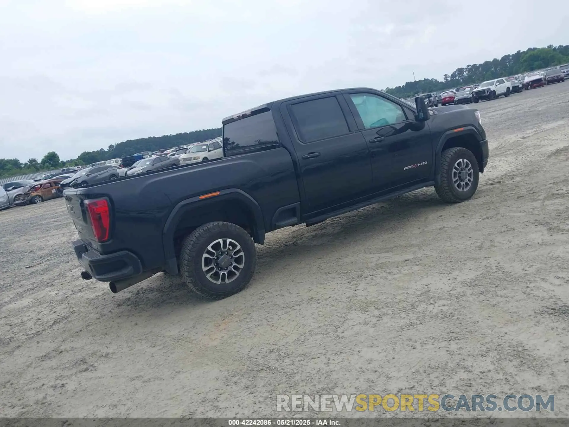 4 Photograph of a damaged car 1GT49PEY9PF114472 GMC SIERRA 2500HD 2023