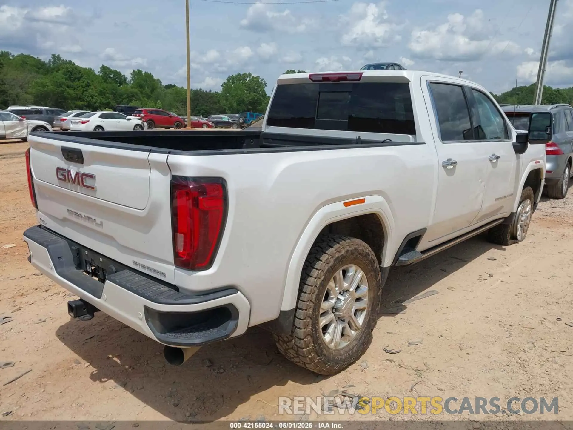 4 Photograph of a damaged car 1GT49REY3PF125057 GMC SIERRA 2500HD 2023