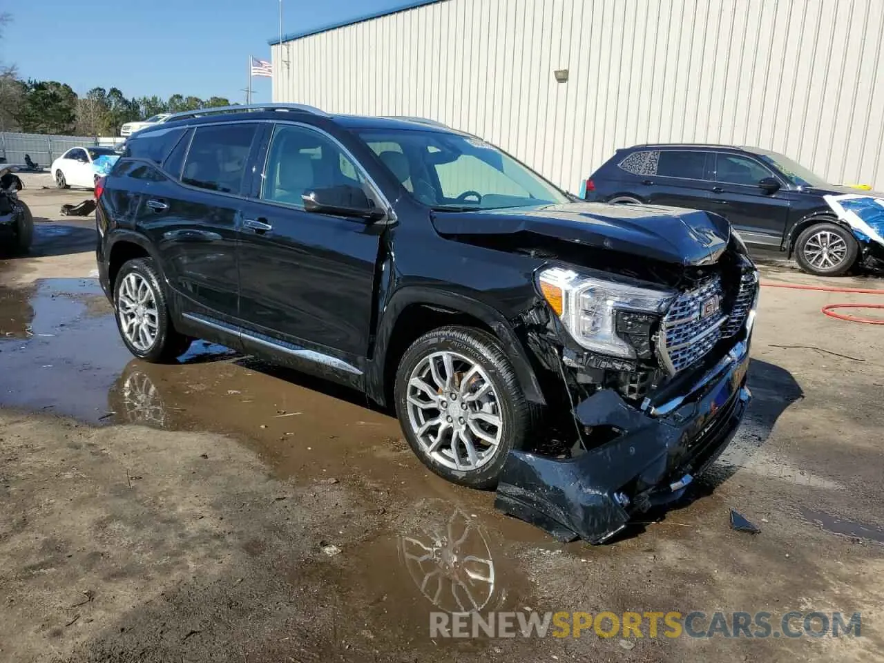 4 Photograph of a damaged car 3GKALXEG1PL217617 GMC TERRAIN 2023