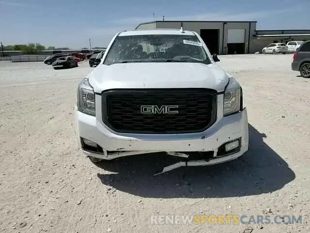 11 Photograph of a damaged car 1GKS1CKJ9KR128706 GMC YUKON 2019