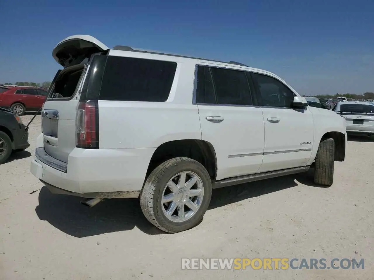 3 Photograph of a damaged car 1GKS1CKJ9KR128706 GMC YUKON 2019