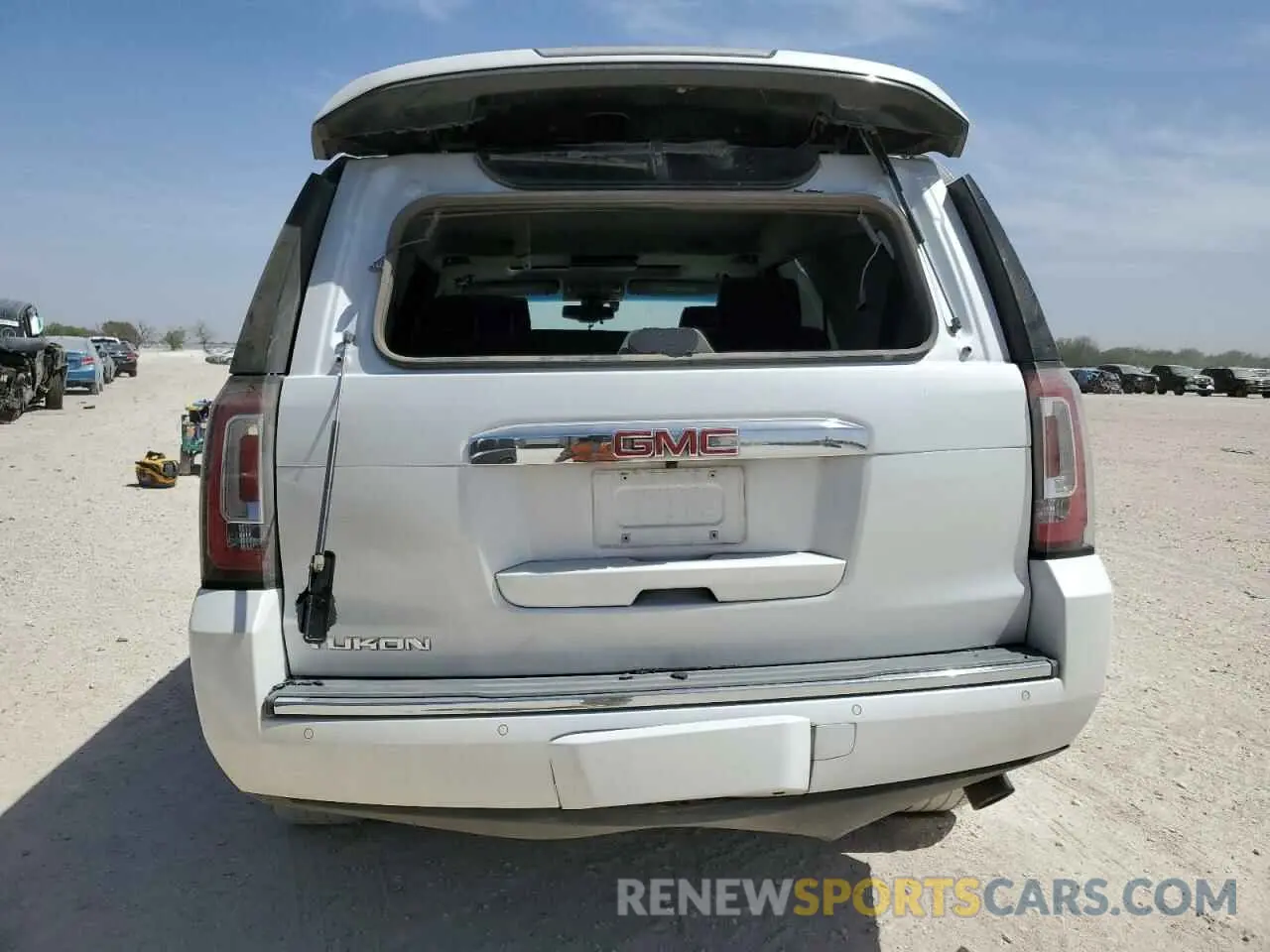6 Photograph of a damaged car 1GKS1CKJ9KR128706 GMC YUKON 2019