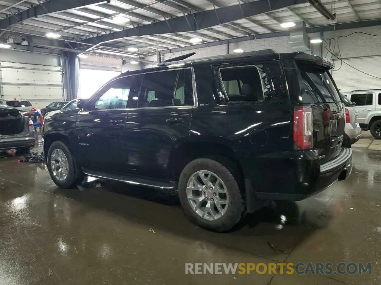 2 Photograph of a damaged car 1GKS2AKC9KR101962 GMC YUKON 2019