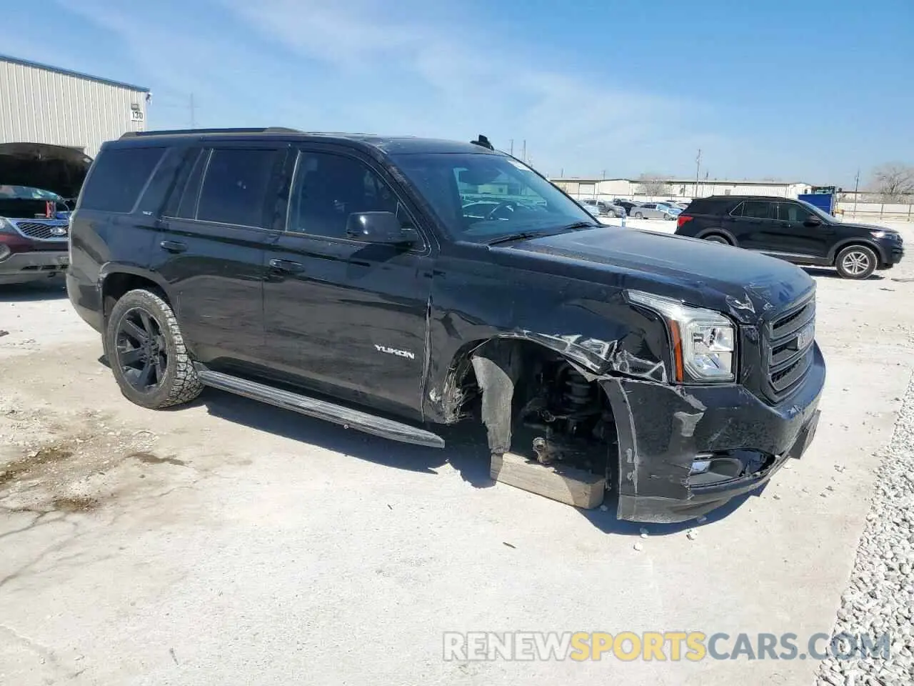 4 Photograph of a damaged car 1GKS2BKJ3KR199763 GMC YUKON 2019