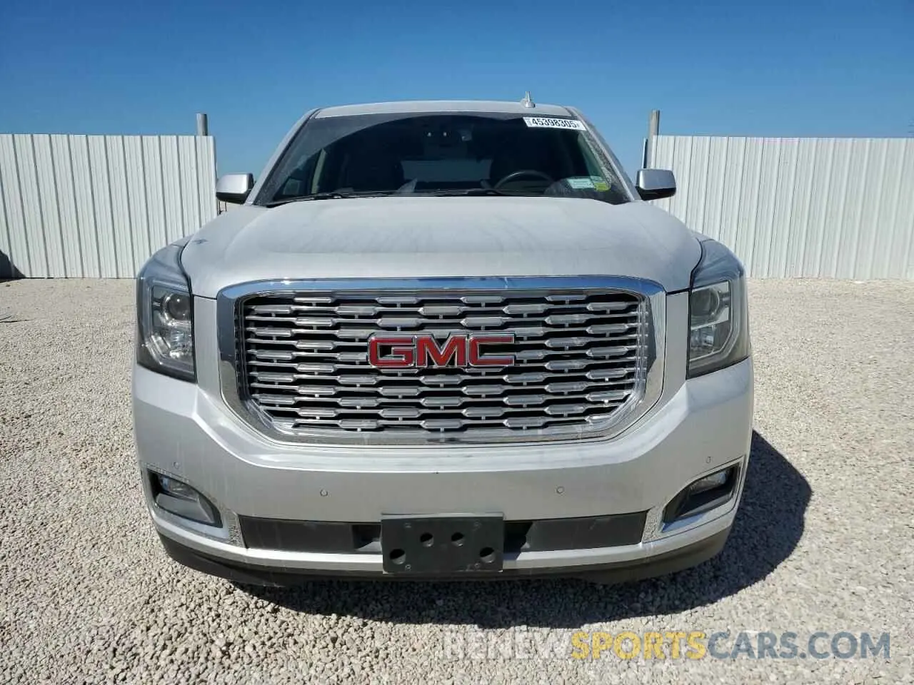 5 Photograph of a damaged car 1GKS2CKJ9KR248647 GMC YUKON 2019