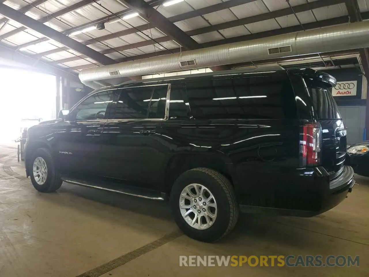 2 Photograph of a damaged car 1GKS2GKC1KR163990 GMC YUKON 2019
