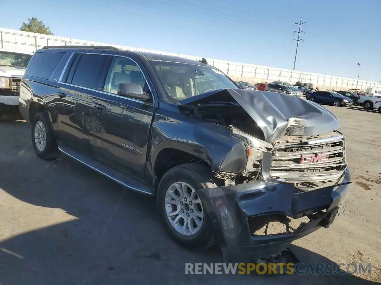 4 Photograph of a damaged car 1GKS2GKC3KR296430 GMC YUKON 2019