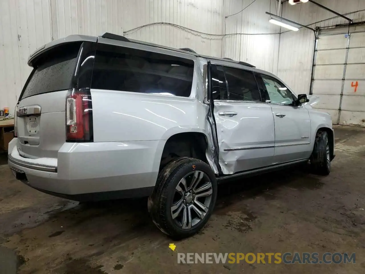 3 Photograph of a damaged car 1GKS2HKJ6KR196276 GMC YUKON 2019