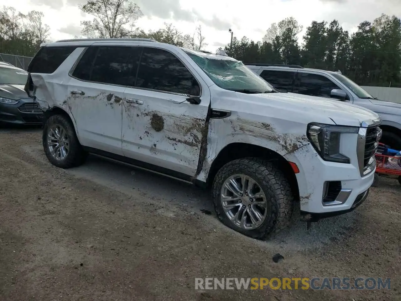 4 Photograph of a damaged car 1GKS1AKD7NR201865 GMC YUKON 2022