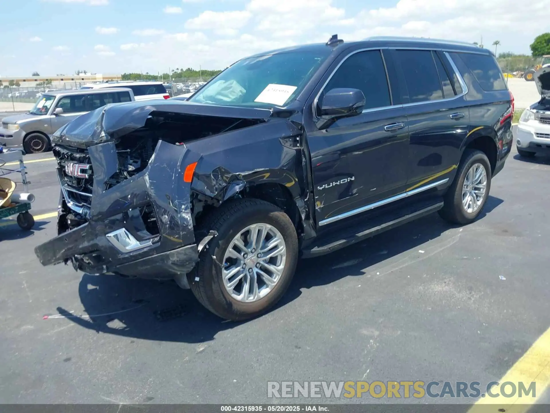 2 Photograph of a damaged car 1GKS1BKD4PR552161 GMC YUKON 2023