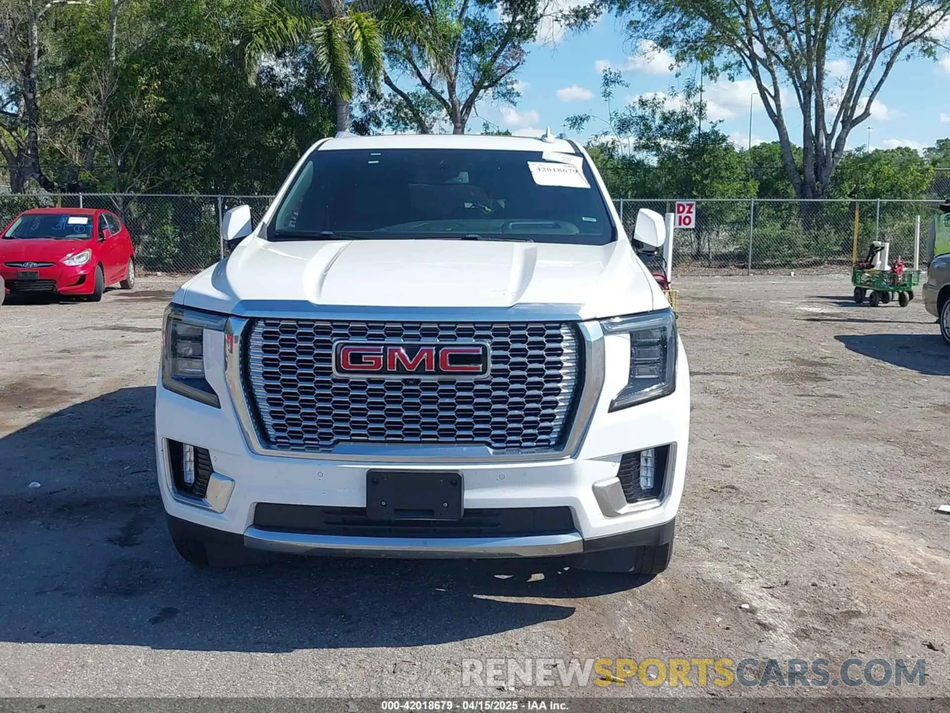 12 Photograph of a damaged car 1GKS1DKL2PR303909 GMC YUKON 2023