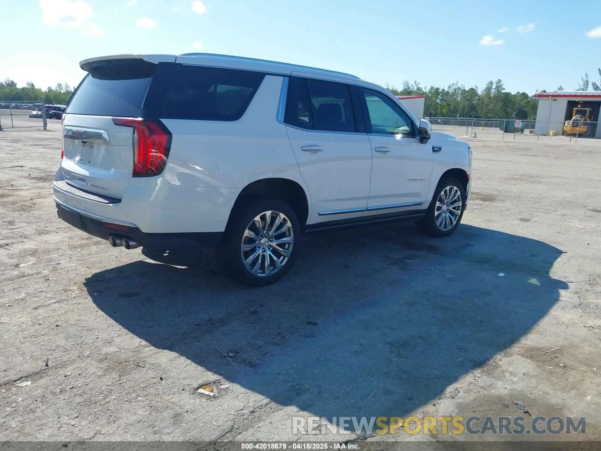 4 Photograph of a damaged car 1GKS1DKL2PR303909 GMC YUKON 2023