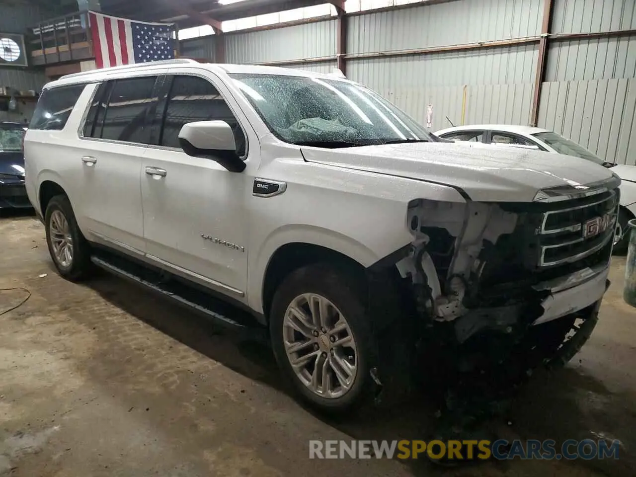 4 Photograph of a damaged car 1GKS2GKD7PR114941 GMC YUKON 2023