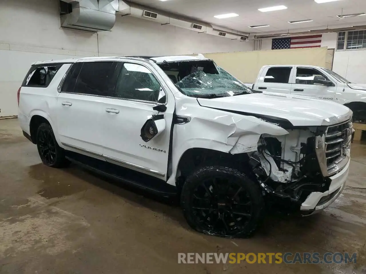 4 Photograph of a damaged car 1GKS2GKT5PR446383 GMC YUKON 2023