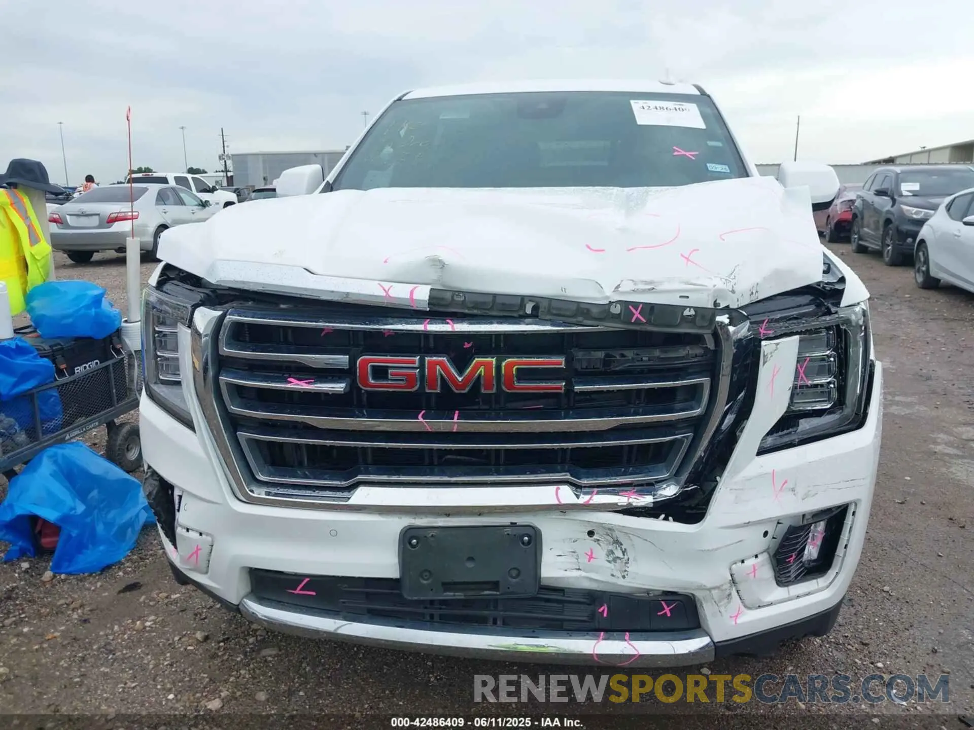13 Photograph of a damaged car 1GKS1BKD9RR232689 GMC YUKON 2024
